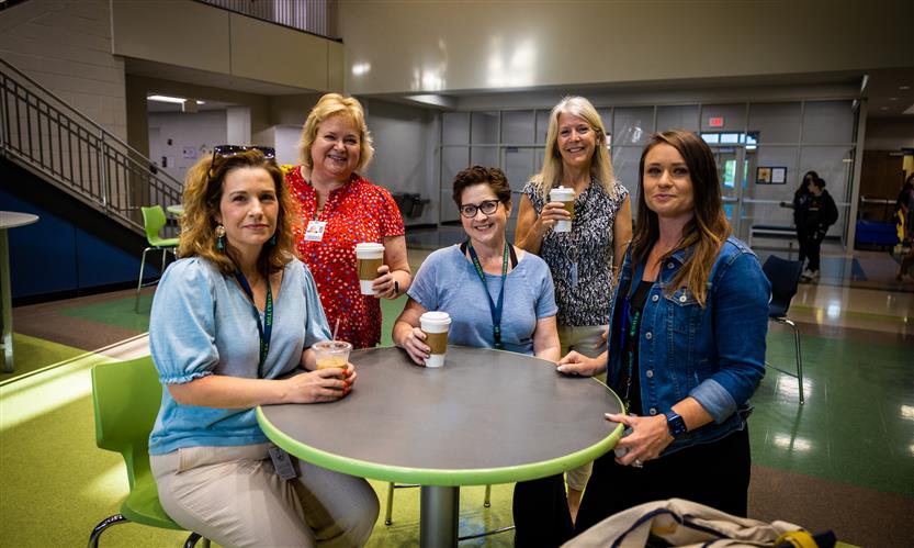 School Board members stand with teachers